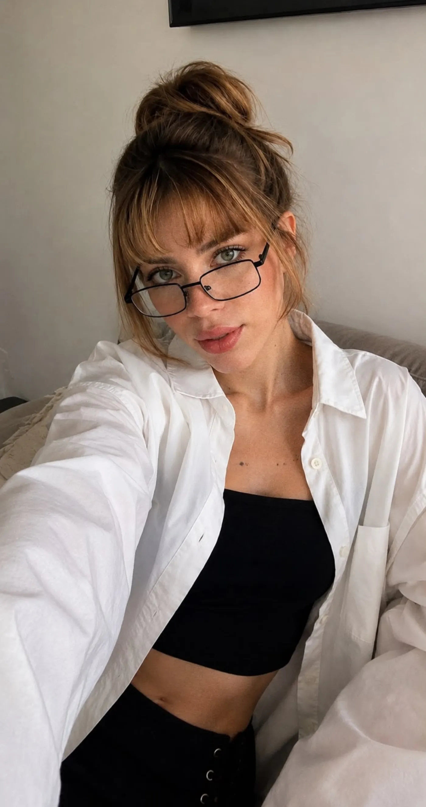 Laine in an oversized white shirt
