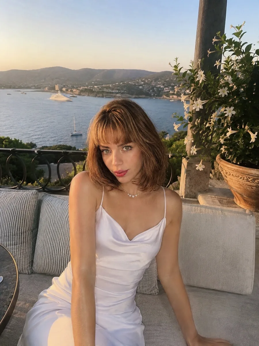 Laine on a terrace above the sea
